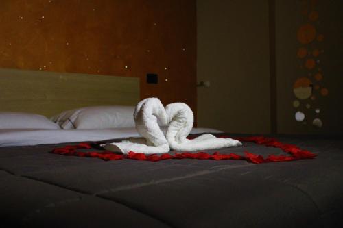Ένα ή περισσότερα κρεβάτια σε δωμάτιο στο B&B Relax in Pompei
