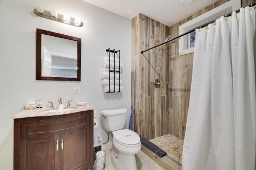 a bathroom with a toilet and a shower at Soose Manor Spa BBQ Games and Bar Near Lake in Tafton