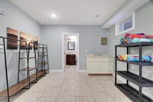 a room with three bunk beds and a bathroom at Soose Manor Spa BBQ Games and Bar Near Lake in Tafton