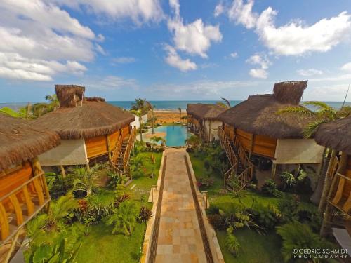 an aerial view of a resort with a swimming pool at Hurricane Jeri in Jericoacoara