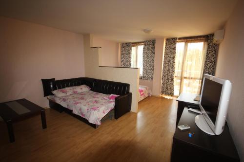 Ένα ή περισσότερα κρεβάτια σε δωμάτιο στο Vadim Apartments in Panorama Beach Vigo Nessebar