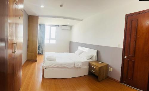 Tempat tidur dalam kamar di Mia Apartment