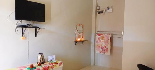 TV a/nebo společenská místnost v ubytování Phuvieng Resort Chiangsaen