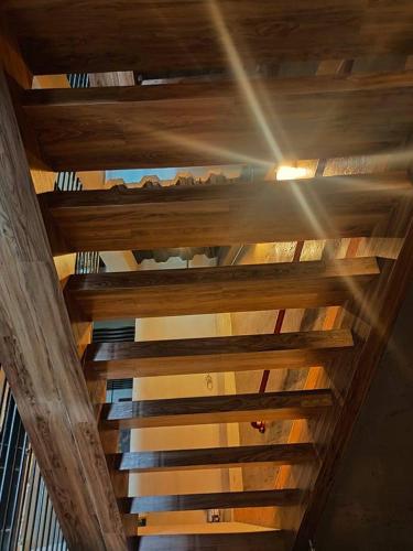 an overhead view of a wooden ceiling with beams at Ramos Hello Stay Cebu in Cebu City