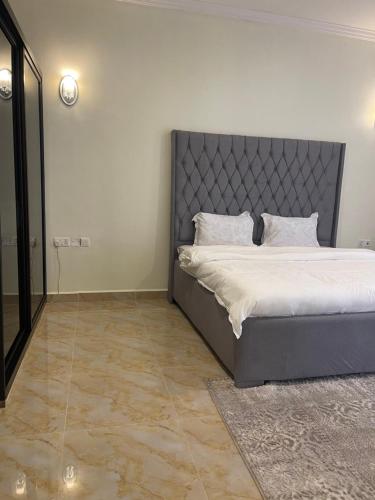 Ένα ή περισσότερα κρεβάτια σε δωμάτιο στο 3BR Sea View Condo
