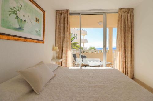 Katil atau katil-katil dalam bilik di MarketHome Sea View Sueño Azul