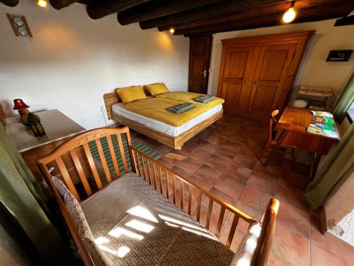 Postel nebo postele na pokoji v ubytování Rustico Bellavista