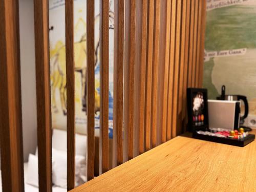 a room with a crib with a picture on it at Grimm's Berlin Mitte in Berlin