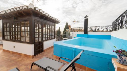 a pool on the roof of a house at Carmen San Luis Albaicin, Granada in Granada