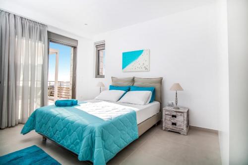 Postel nebo postele na pokoji v ubytování Francis & Gregorys Luxury Villas