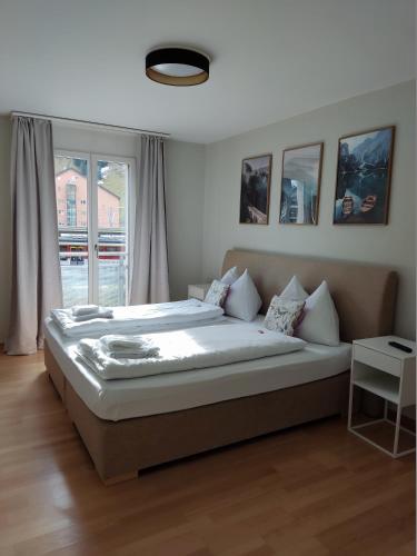 Ένα ή περισσότερα κρεβάτια σε δωμάτιο στο Central Serviced Apartment