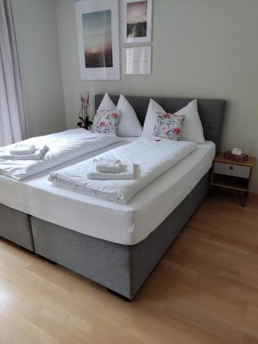 Ένα ή περισσότερα κρεβάτια σε δωμάτιο στο Central Serviced Apartment