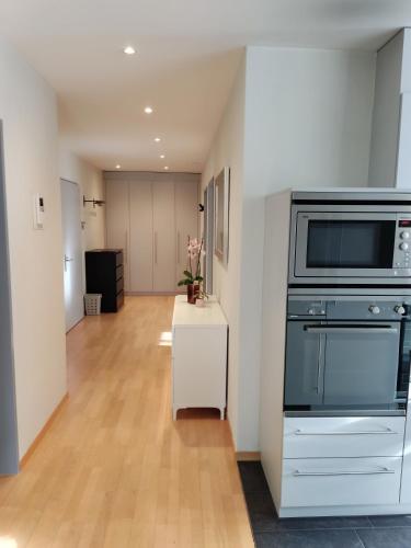 Η κουζίνα ή μικρή κουζίνα στο Central Serviced Apartment