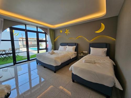 Katil atau katil-katil dalam bilik di Ipoh Young Villa - Hotel Inspired