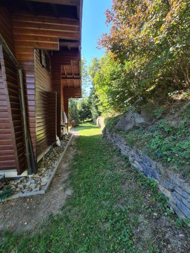 a path next to a house next to a building at Porkka COSY & QUIET chalet 8 pers in Vex
