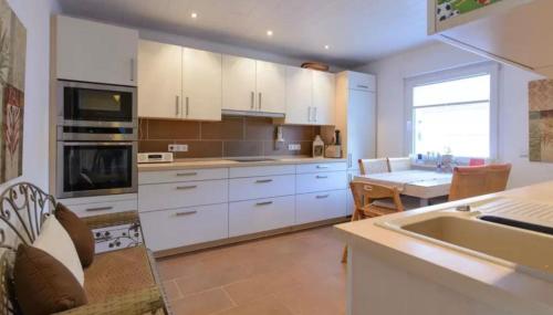 Η κουζίνα ή μικρή κουζίνα στο Maintal Apartment 1