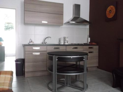 Kuchyň nebo kuchyňský kout v ubytování Appartements Bon Secours