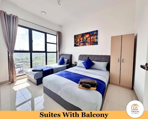 a hotel room with two beds and a window at Trion Kuala Lumpur Near Sunway Velocity KLCC TRX Bukit Bintang in Kuala Lumpur