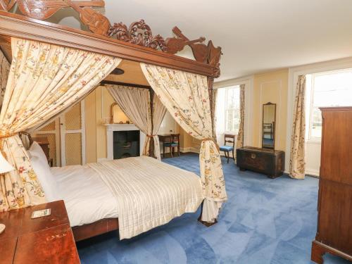 En eller flere senge i et værelse på Wootton House