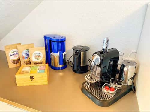 a coffee maker sitting on top of a counter at Ferienwohnung Schweinfurt in Schweinfurt