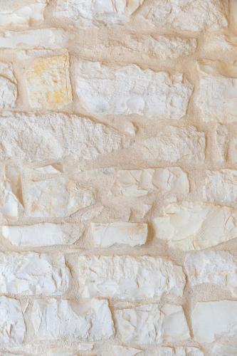 a stone wall of a building at Il Fiore del Conero in Sirolo