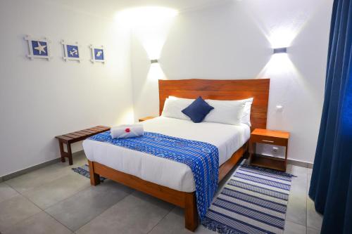 Krevet ili kreveti u jedinici u okviru objekta Villa Martins, Inhaca, Mozambique