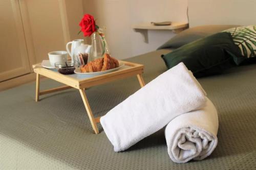 Postel nebo postele na pokoji v ubytování Nuovo Hotel Giardini