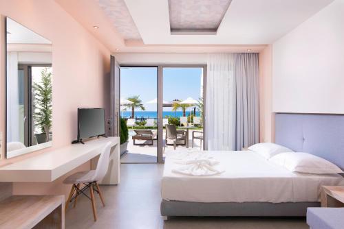 Postel nebo postele na pokoji v ubytování Aegean Infinity Deluxe