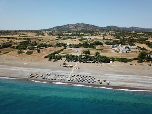 an aerial view of a beach with a group of people at Mojito Beach Rooms in Lachania