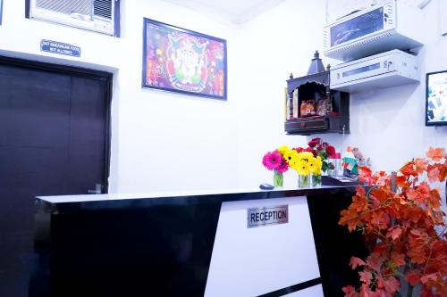 Μια τηλεόραση ή/και κέντρο ψυχαγωγίας στο Hotel Tom International - Near Nizamuddin Railway Station