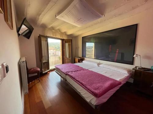 Postel nebo postele na pokoji v ubytování Alojamiento Rural Coliving Sojuela