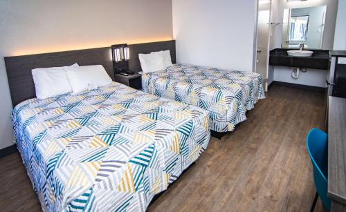 Katil atau katil-katil dalam bilik di Motel 6-Ft. Pierce, FL