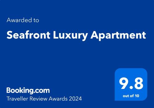 Et logo, certifikat, skilt eller en pris der bliver vist frem på Seafront Luxury Apartment