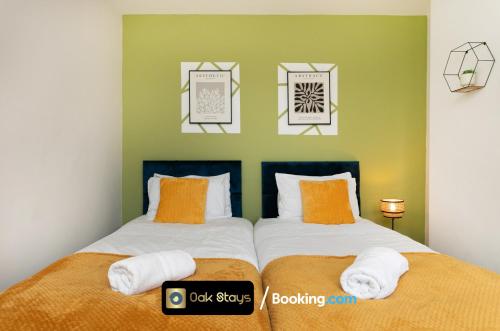 A bed or beds in a room at Fosse Road North By Oak Stays Short Lets & Serviced Accommodation Leicester With Free WiFi