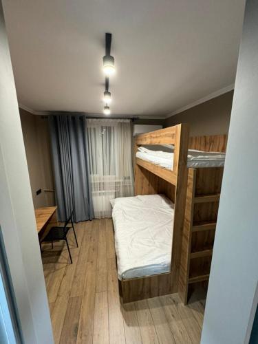 Postel nebo postele na pokoji v ubytování Cozy Hostel