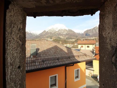 a view of a mountain from a window of a building at Retreat in the Dolomites in Chies dʼAlpago