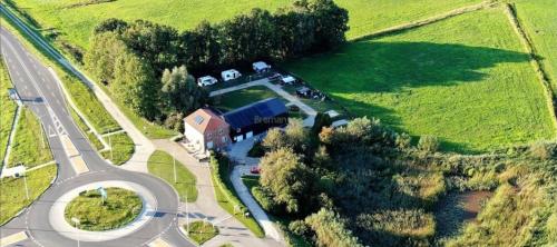 an aerial view of a house and a road at Camping de Noorde in Zwartsluis