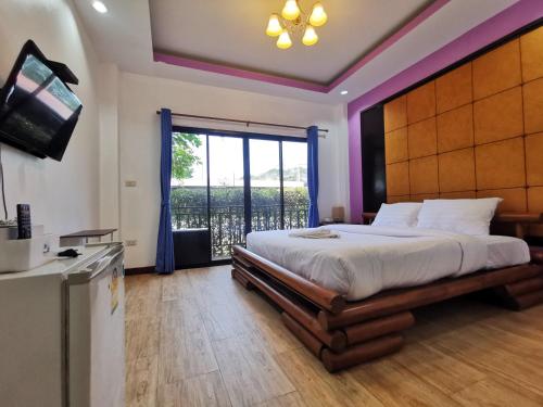 Kan Home Hotelにあるベッド