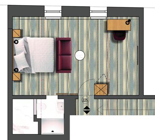 a floor plan of a room with a bed at Hotel Miriquidi All Inklusive in Kurort Oberwiesenthal