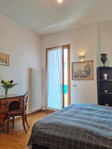 Postel nebo postele na pokoji v ubytování Casa Mutti