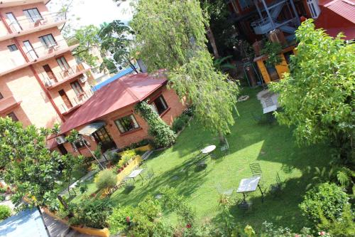 an overhead view of a house with a yard at Royal Astoria Hotel in Kathmandu
