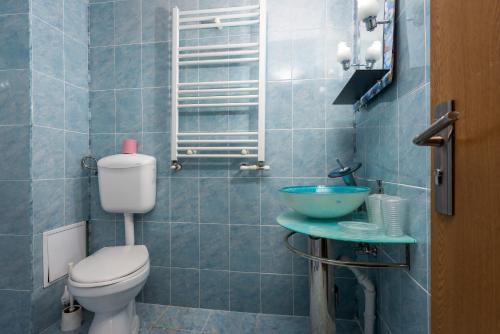 Ένα μπάνιο στο Central Apartament Predeal Nr 7