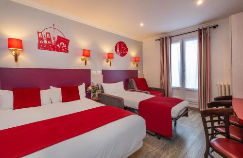 Ένα ή περισσότερα κρεβάτια σε δωμάτιο στο Grand Hôtel De Turin