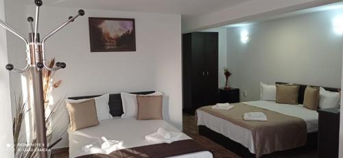 Katil atau katil-katil dalam bilik di Casa MagicPlace