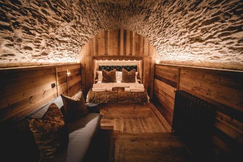 Rúm í herbergi á Chalet Cime Bianche