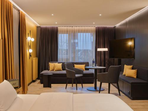 Postel nebo postele na pokoji v ubytování Hotel am Sophienpark
