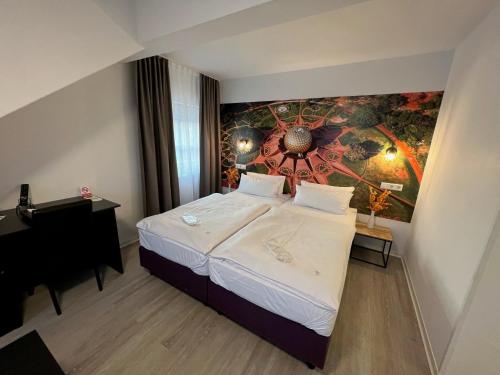Postel nebo postele na pokoji v ubytování Hotel Bitzer Backnang Zentrum 24h CHECK IN HIGHSPEED WIFI BAHNOF 500m