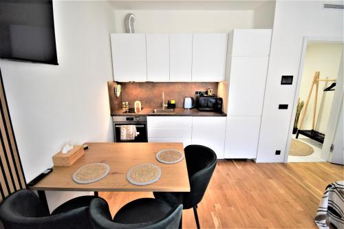 Dapur atau dapur kecil di Jasminn Apartments