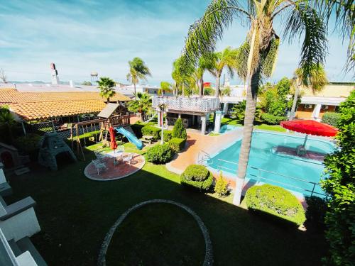 an aerial view of a resort with a swimming pool at Hotel La Cascada in Aguascalientes