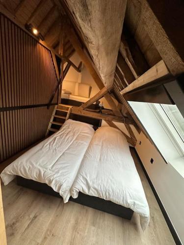 Gîte de la vieille grangeにあるベッド